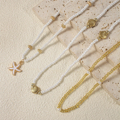 NAIA – White & Gold Starfish Beaded Choker