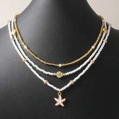 NAIA – White & Gold Starfish Beaded Choker